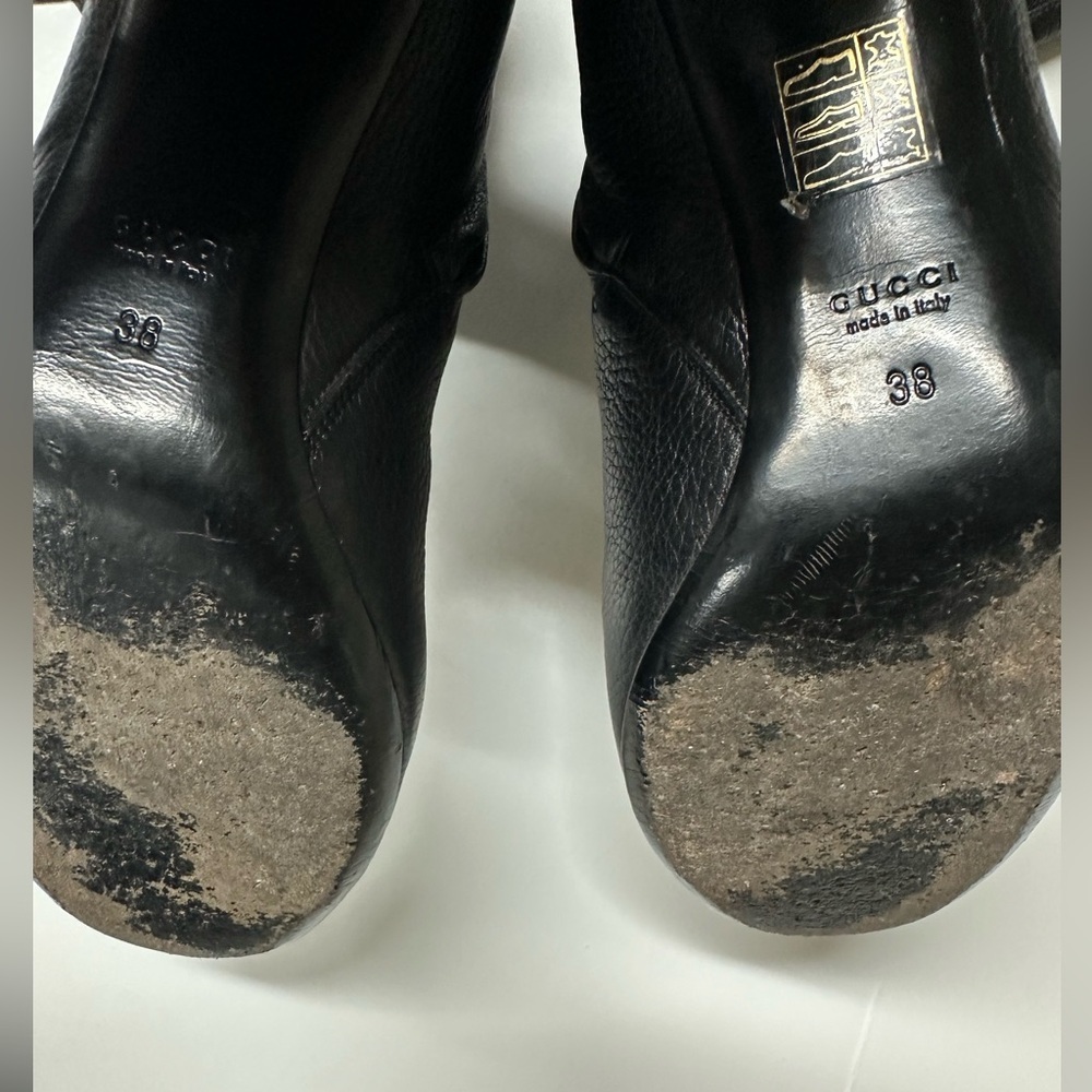 Gucci Women’s Black Leather Knee-High Heeled Boots with gold GG buckle strap - Picture 11 of 12